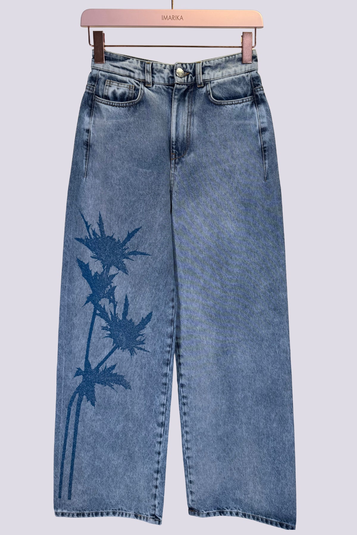 jeans con fiore