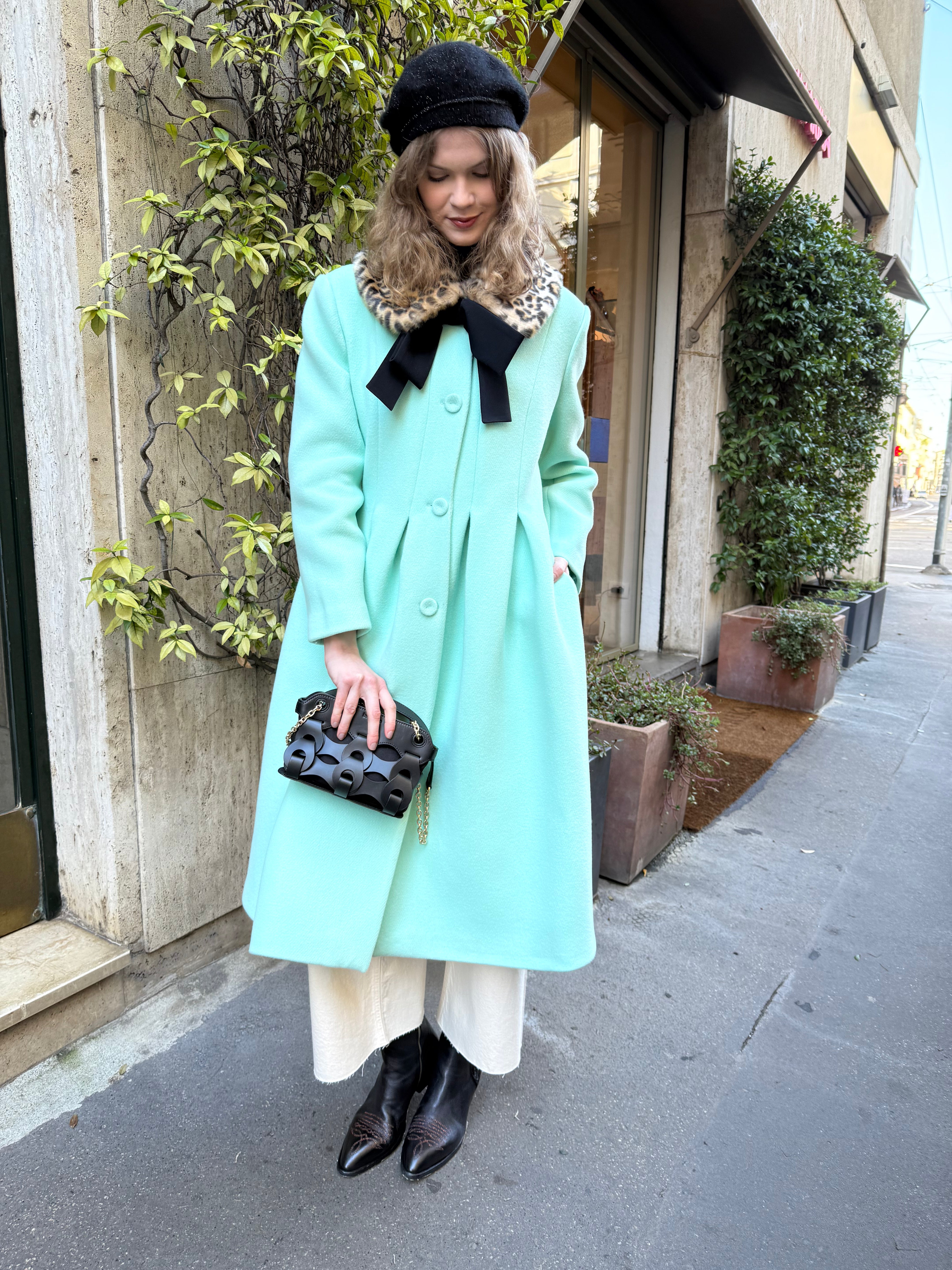 Cappotto con collo in pellicia