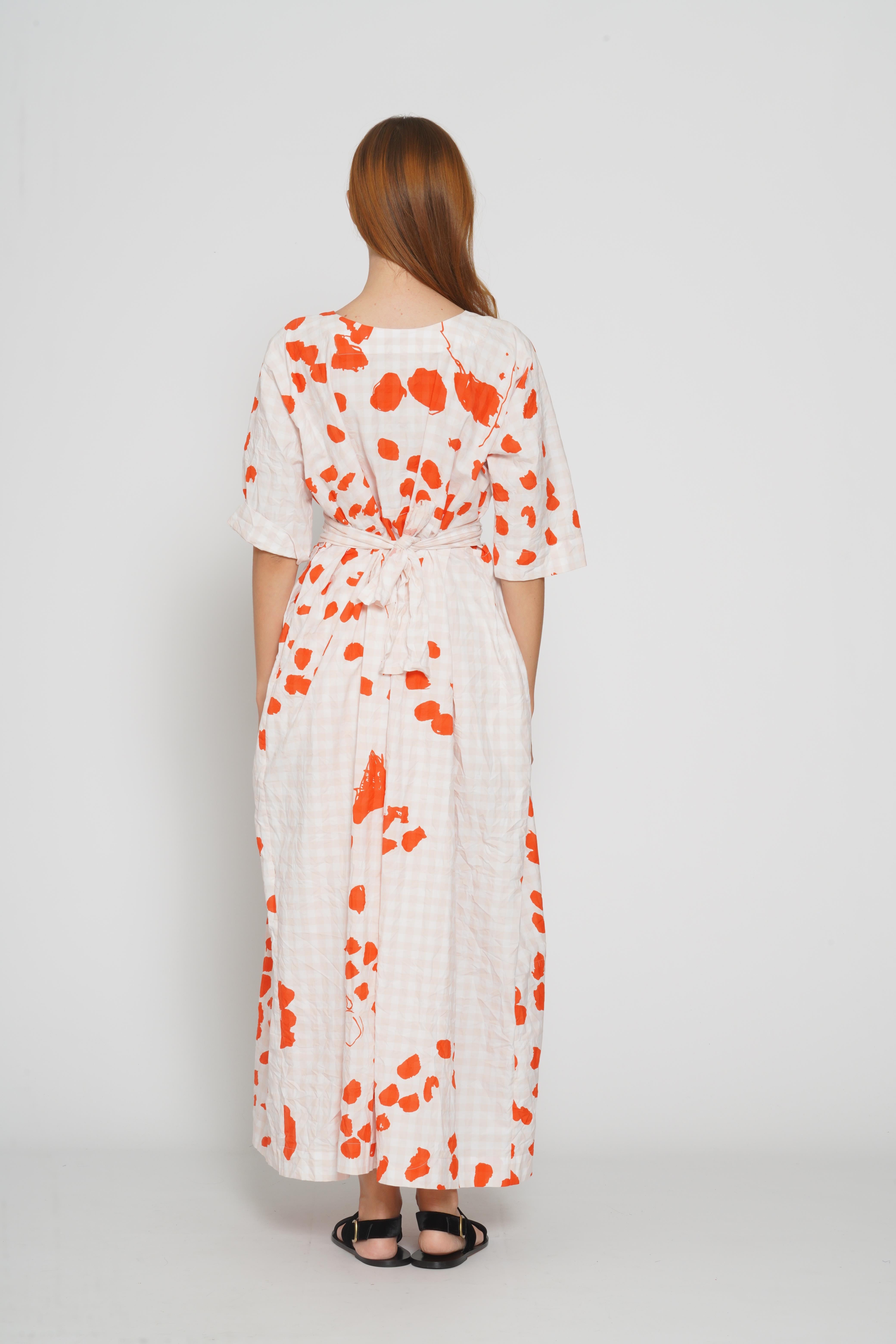 Abito in vichy con macchie arancio