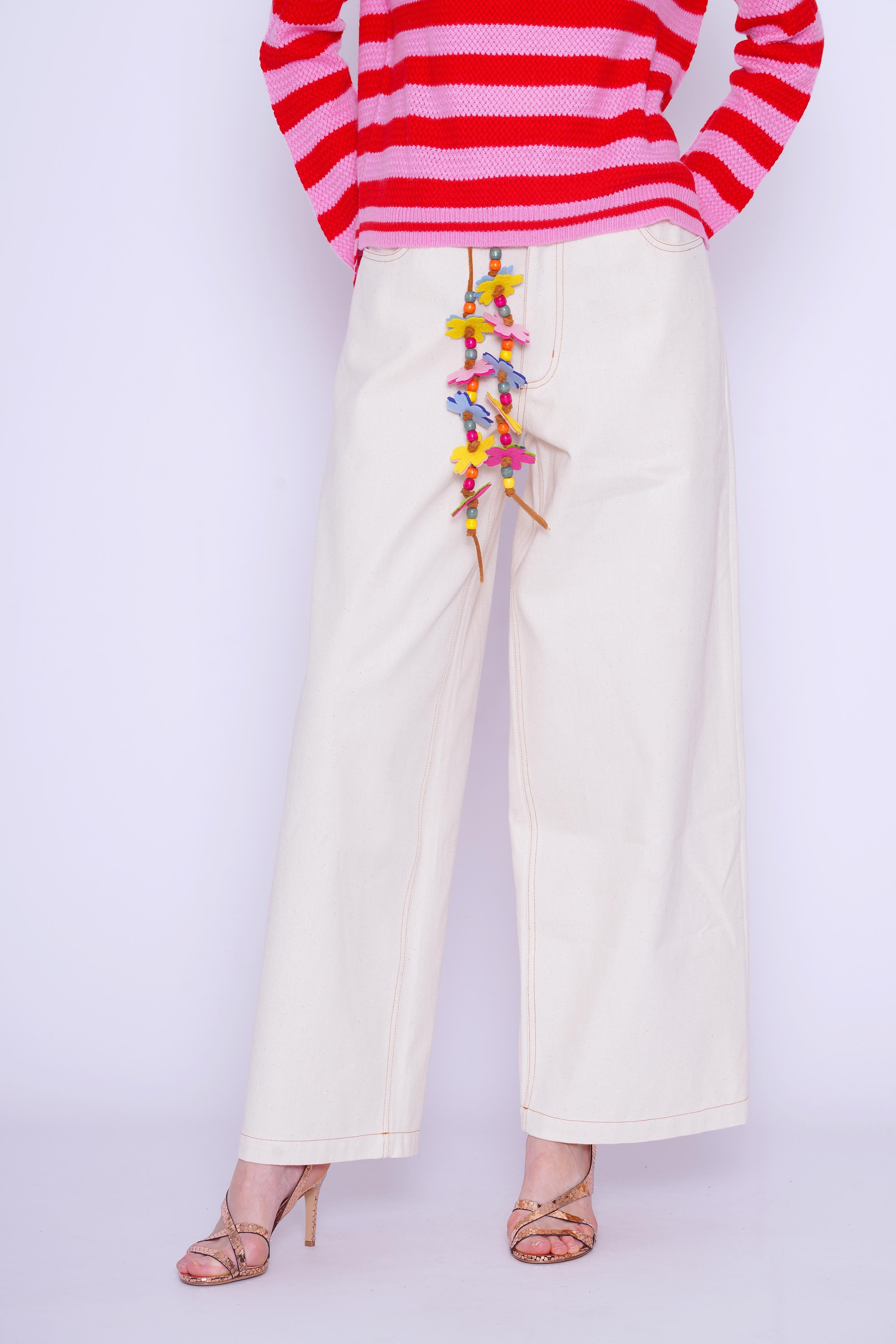 Jeans con cintura floreale