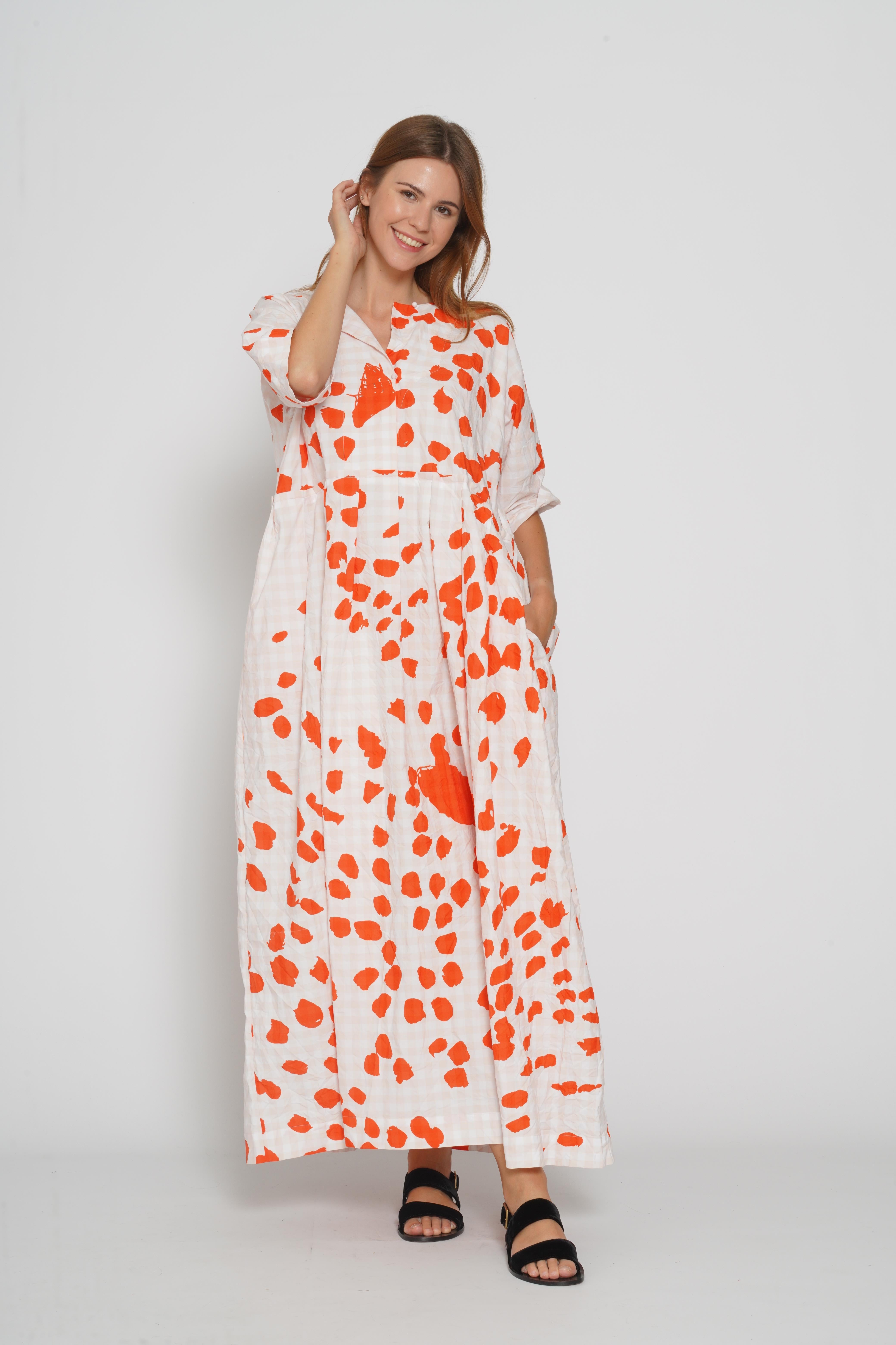 Abito in vichy con macchie arancio