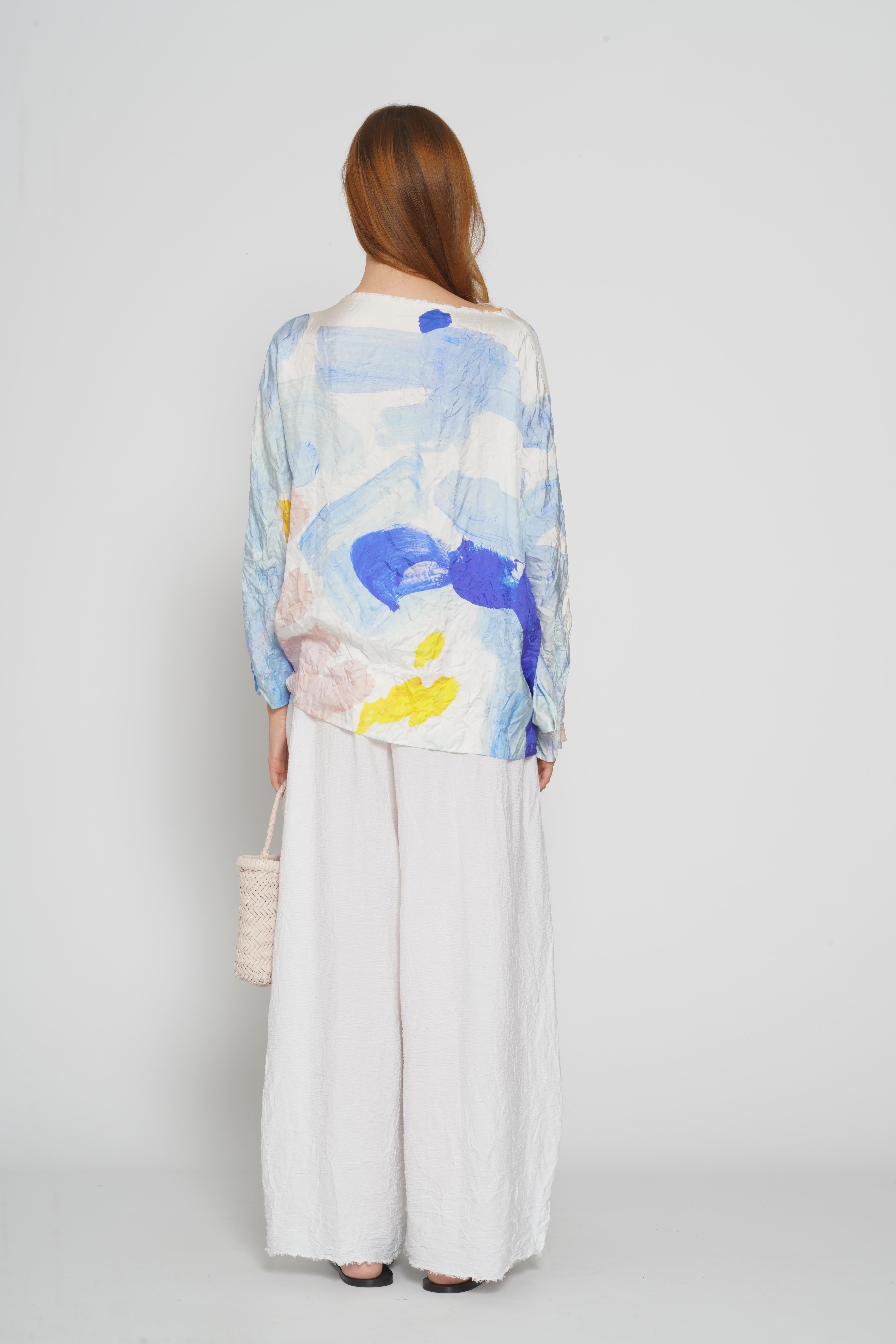 Pantalone bianco stropicciato