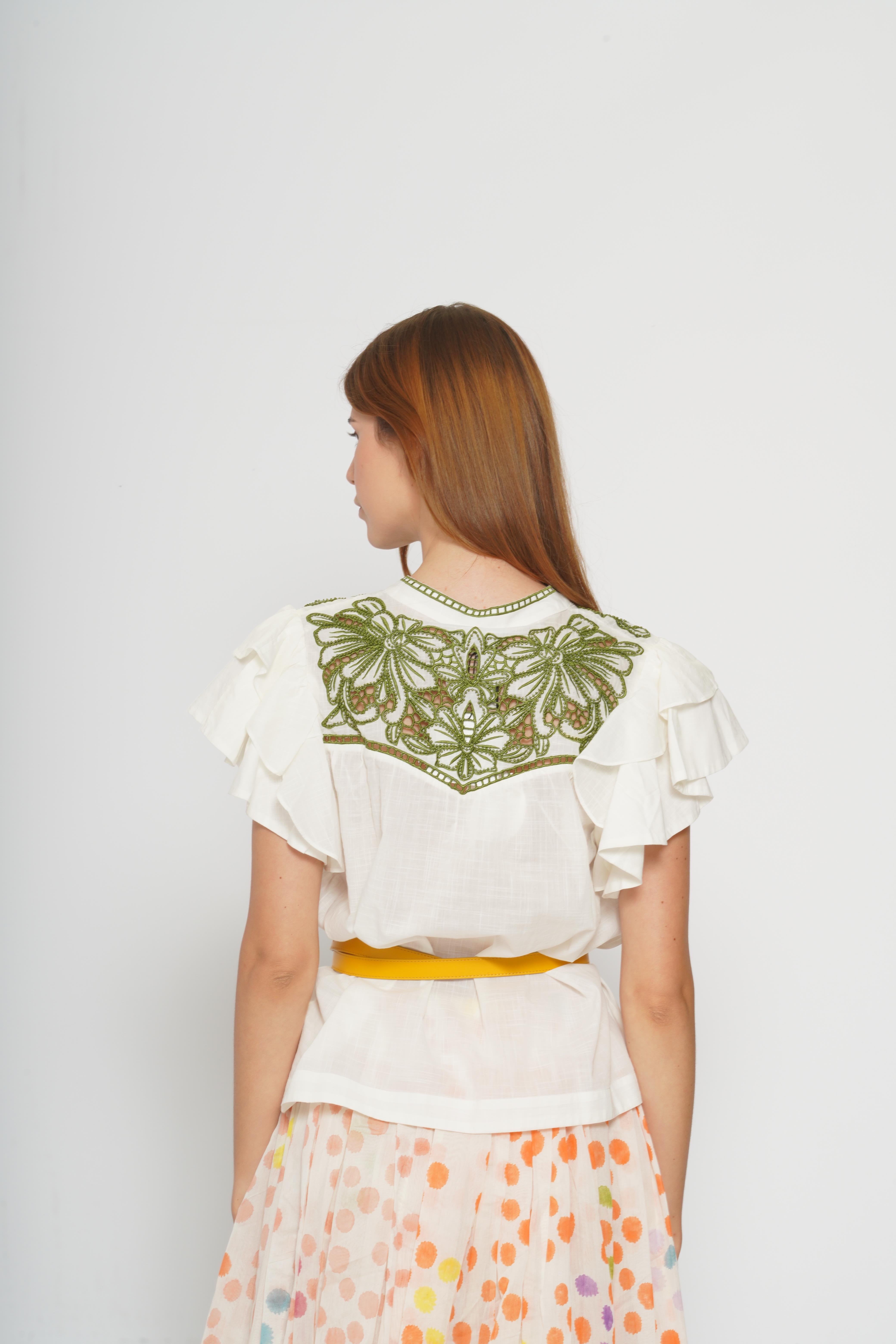 Blusa con ricami