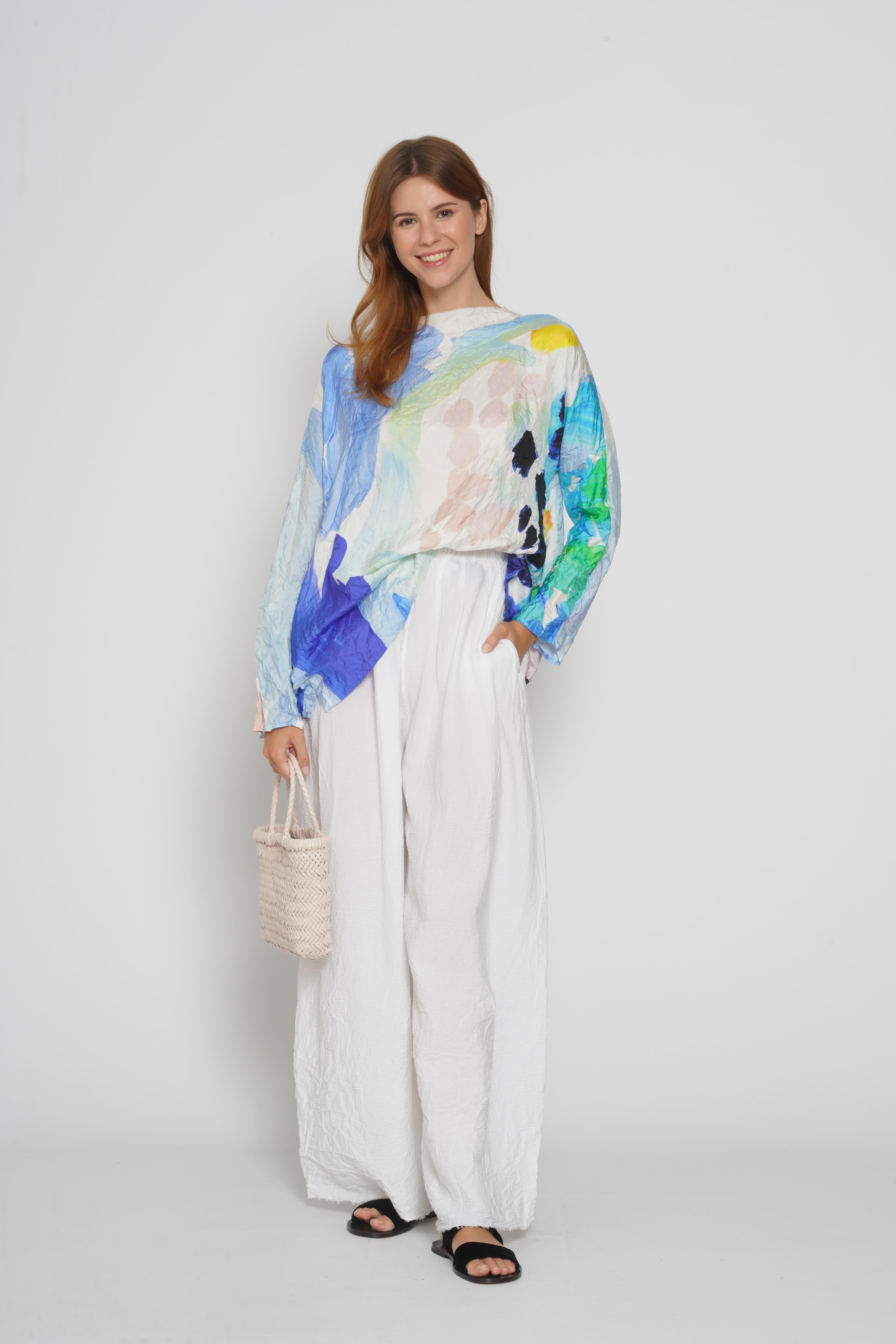 Pantalone bianco stropicciato