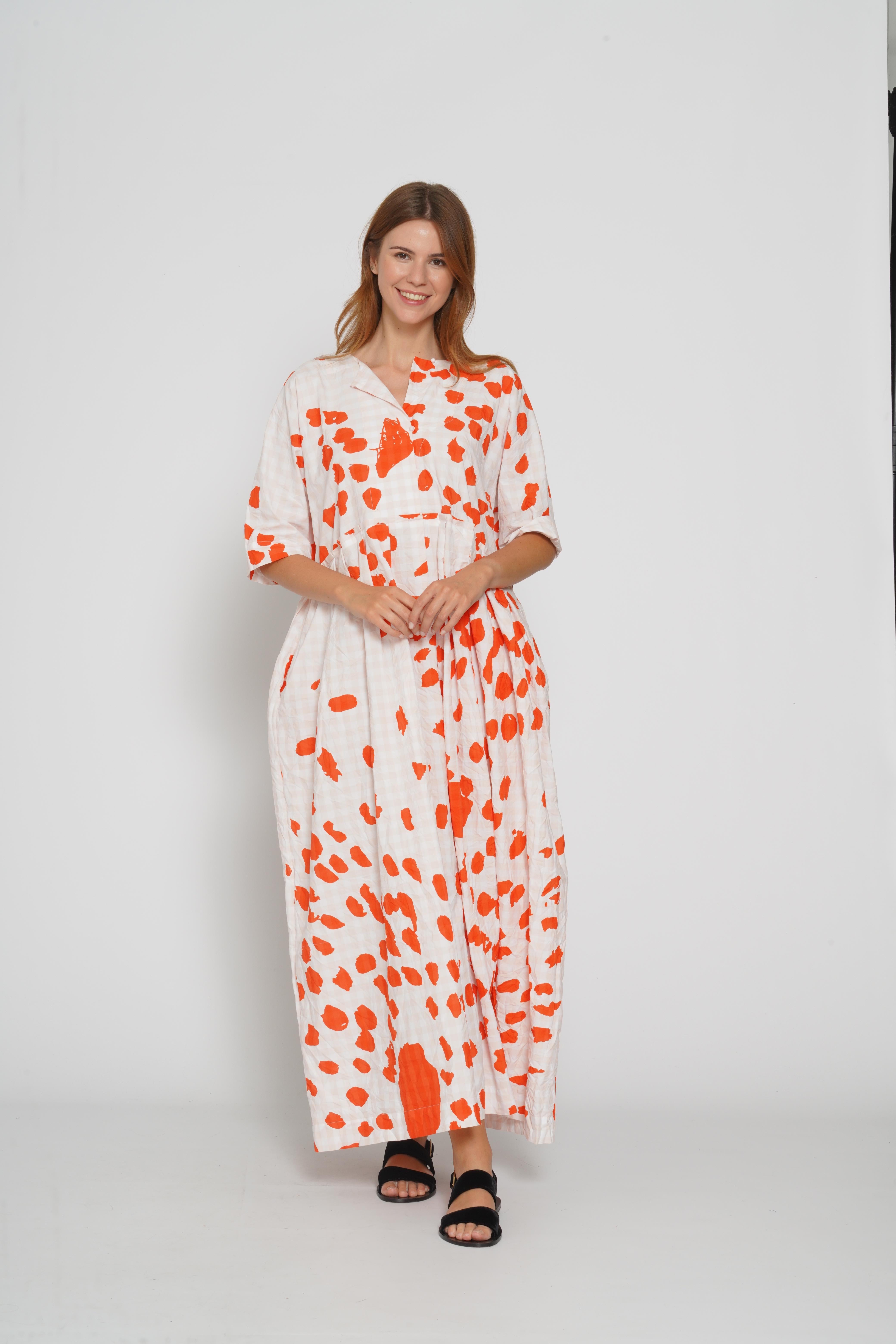 Abito in vichy con macchie arancio
