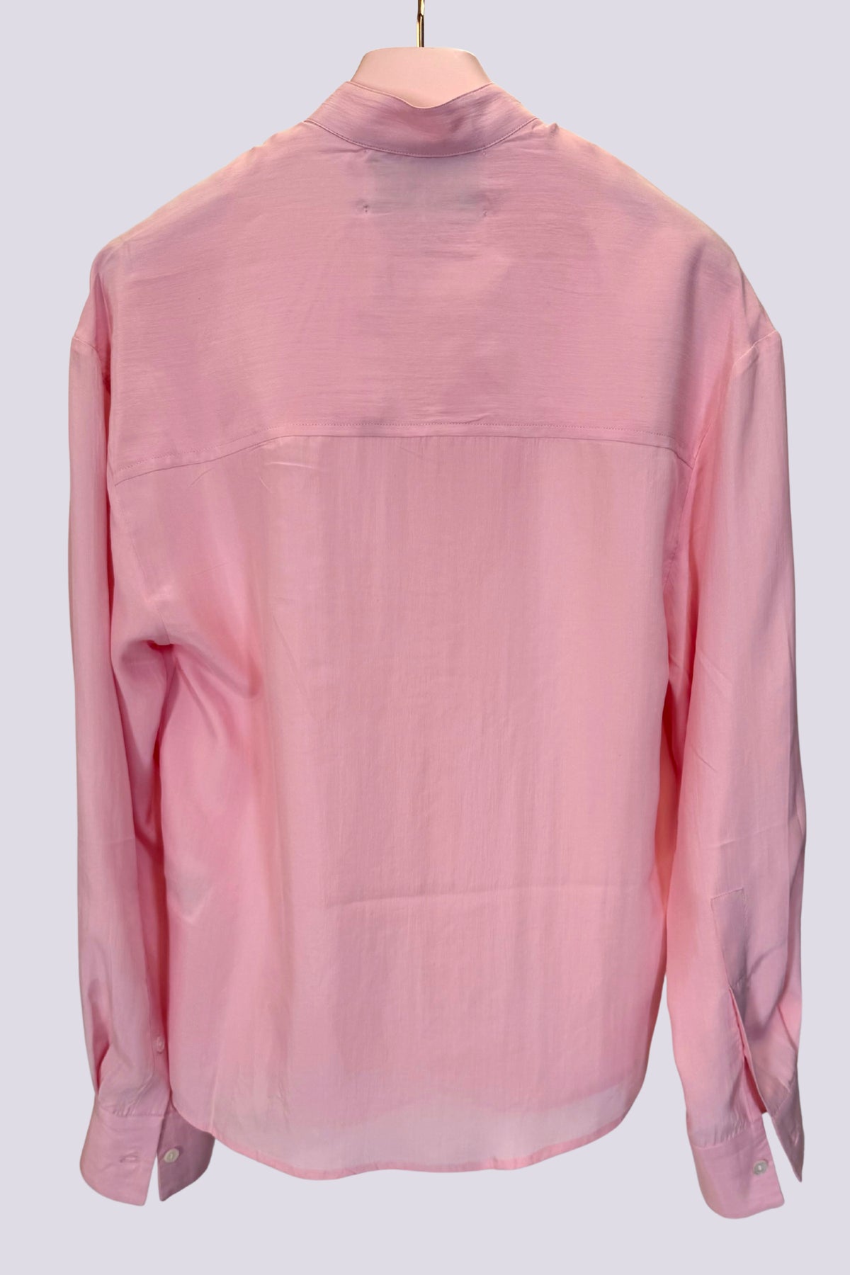 Camicia rosa con volant 