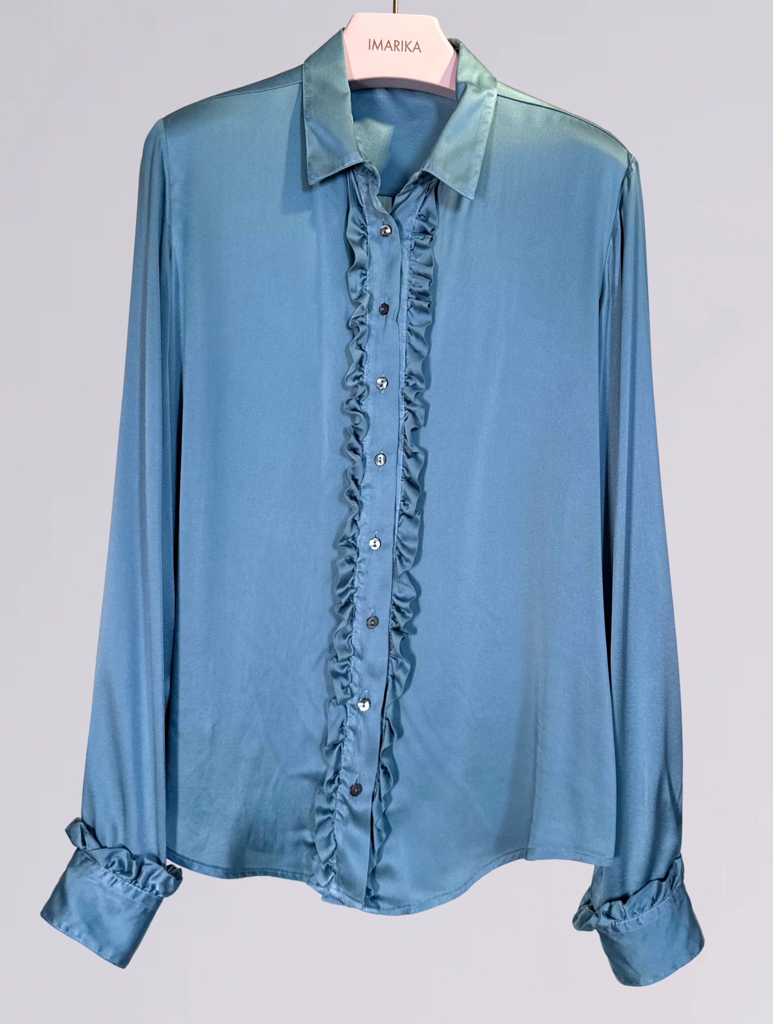 Camicia di seta azzurra 