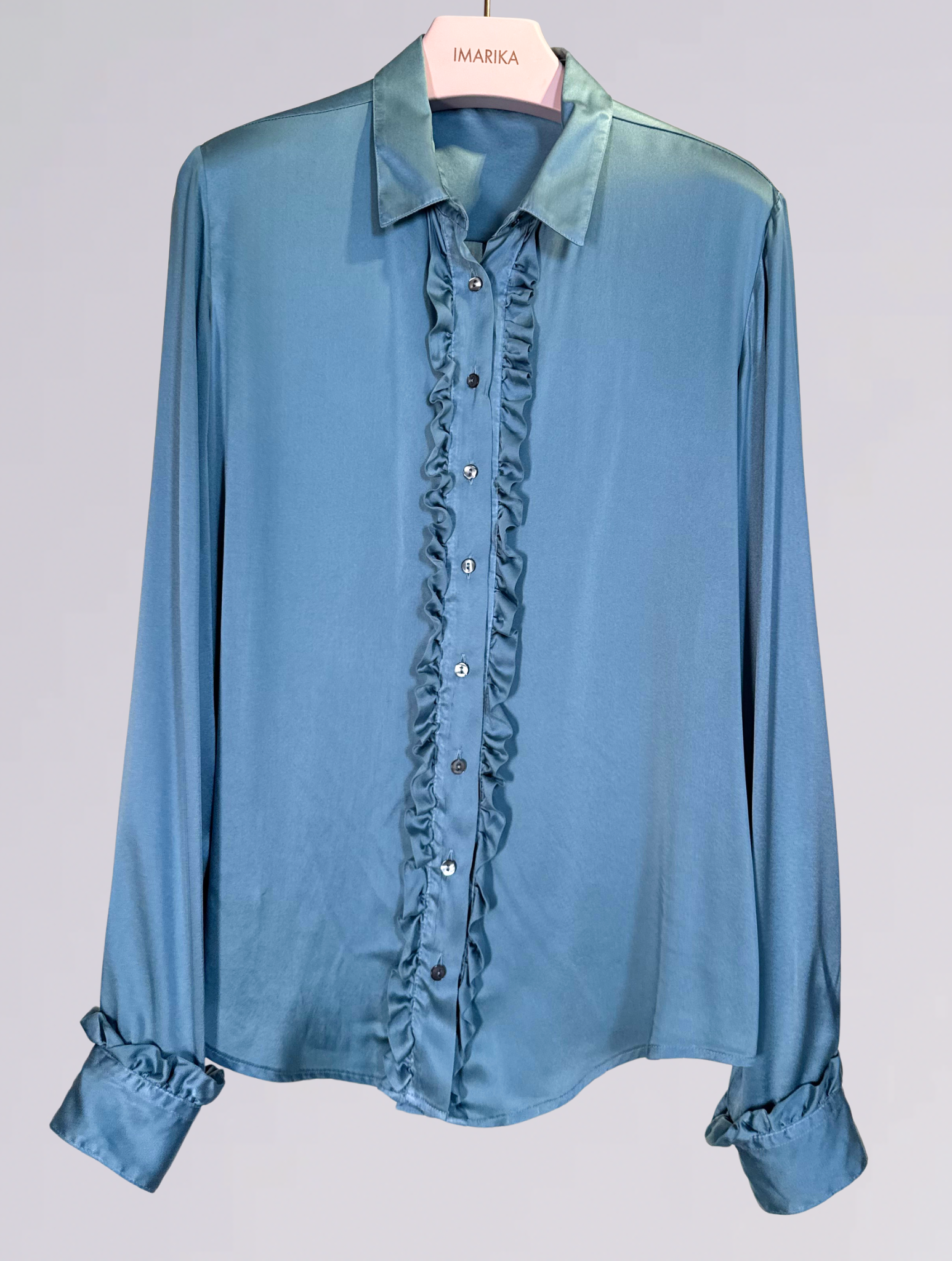 Camicia di seta azzurra 