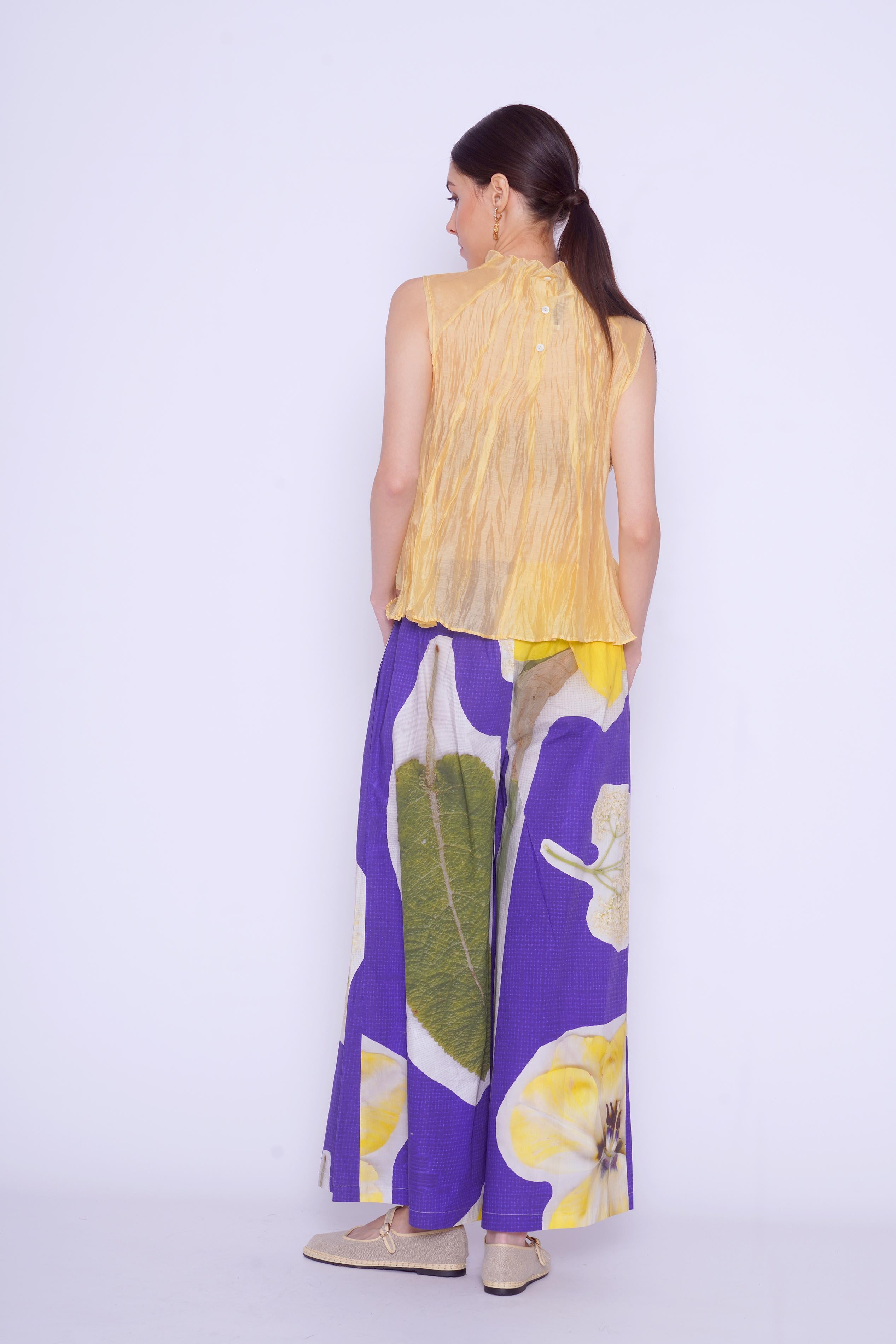 PANTALONI CON COLLAGE DI FIORI 